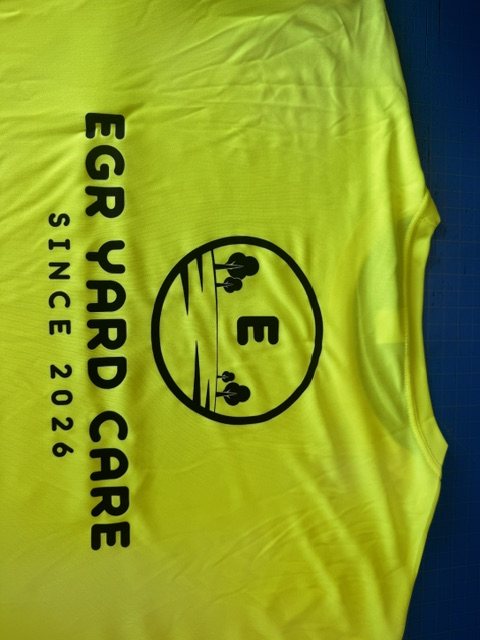 EGR Yard Care, Since 2026 — black logo screen-printed on a hi-vis safety yellow tee