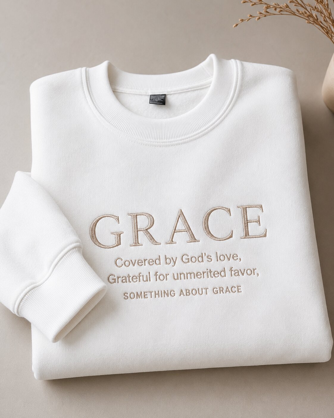Grace embroidered crewneck — cream thread on white fleece